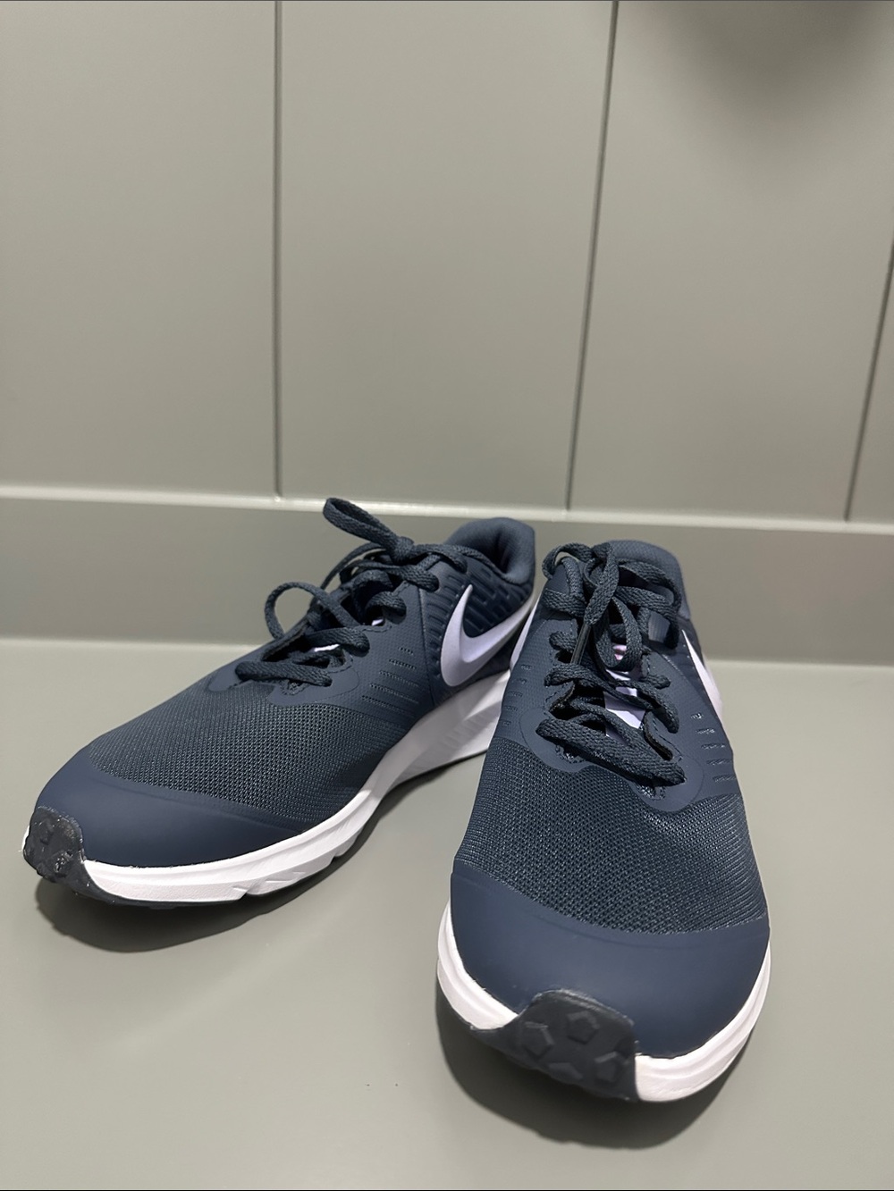 Nike Woman’s Navy and White Athletic Running Shoes